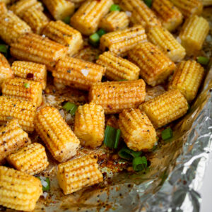 roasted baby corn on a sheet