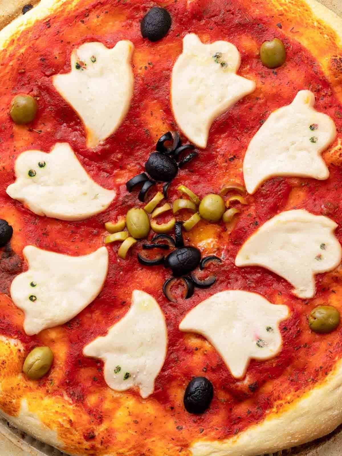 Ghost Pizza for Halloween with Olive Spiders.